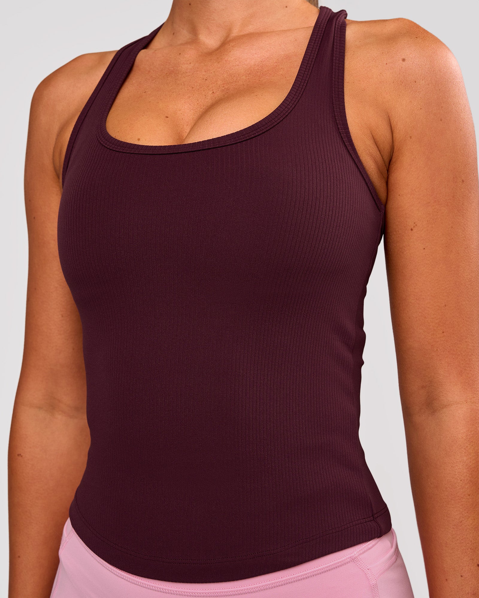 Woman wearing Flow Rib Scoop Neck Tank - Cherry Lacquer | Model:Charli | Size:XS