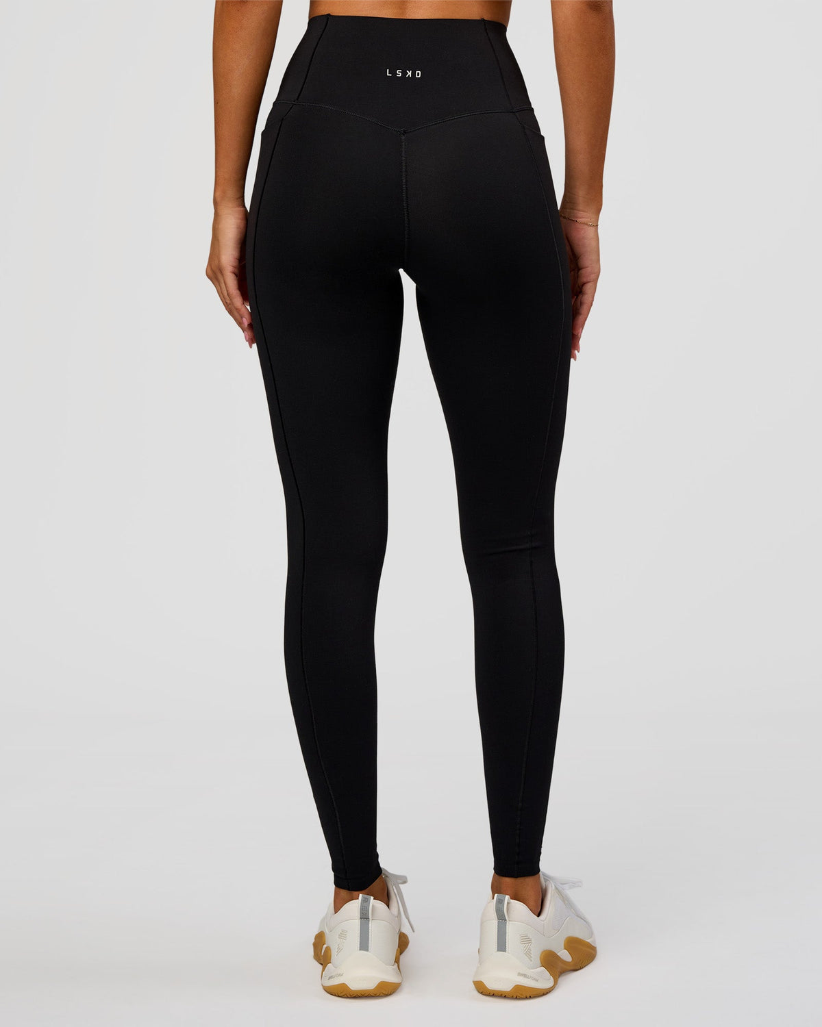 Woman wearing Fusion Bonded High-Rise Full Length Legging Pockets - Black | Model:Charli | Size:XS