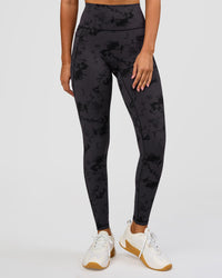 Woman wearing Fusion Ultra High-Rise Full Length Legging Pockets - Black Tie Dye | Model:Charli | Size:XS | Thumbnail Index: 1