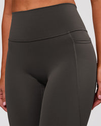 Woman wearing Fusion Ultra High-Rise Full Length Legging Pockets - Onyx | Model:Charli | Size:XS | Thumbnail Index: 6