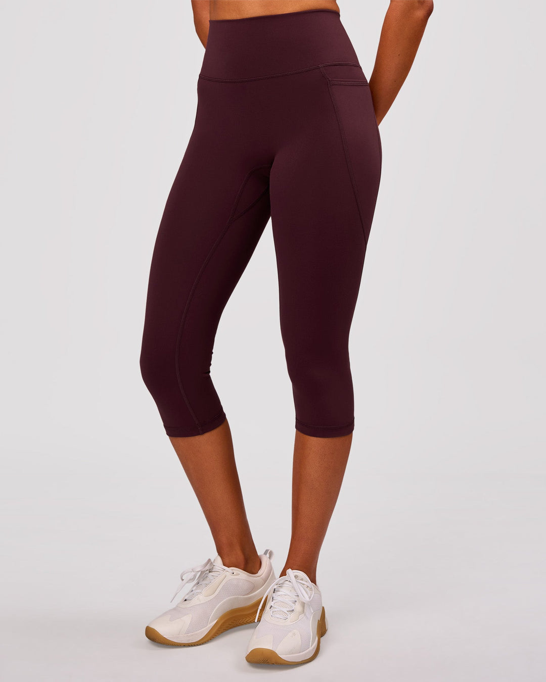 Woman wearing Fusion V Contour Ultra High-Rise 3/4 Legging Pockets - Cherry Lacquer | Model:Charli | Size:XS - view 2