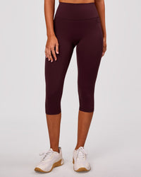 Woman wearing Fusion V Contour Ultra High-Rise 3/4 Legging Pockets - Cherry Lacquer | Model:Charli | Size:XS | Thumbnail Index: 3