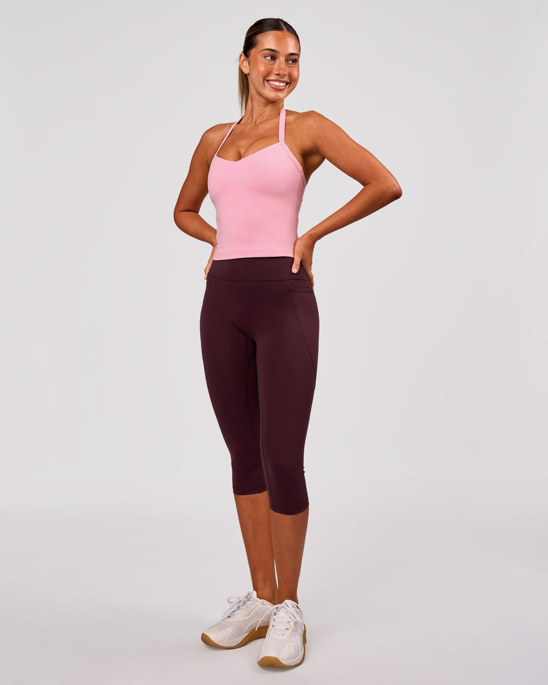 Woman wearing Fusion V Contour Ultra High-Rise 3/4 Legging Pockets - Cherry Lacquer | Model:Charli | Size:XS - view 5