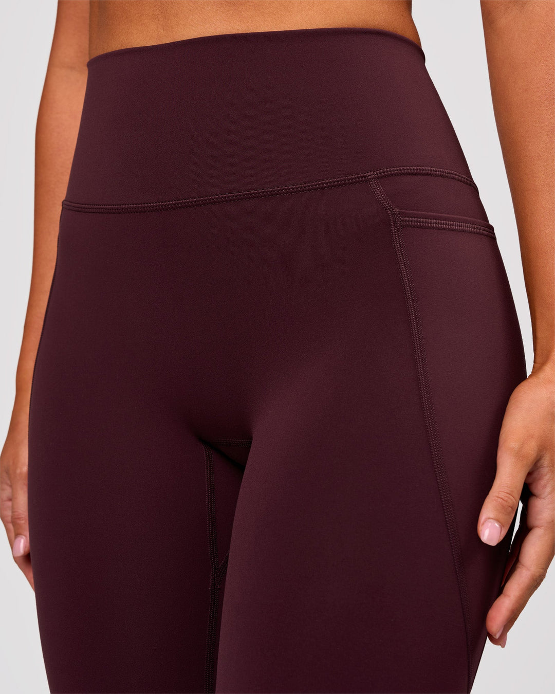Woman wearing Fusion V Contour Ultra High-Rise 3/4 Legging Pockets - Cherry Lacquer | Model:Charli | Size:XS - view 6