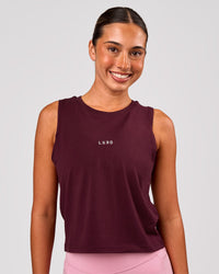 Woman wearing Go-To FLXCotton Midline Tank - Cherry Lacquer-White | Model:Charli | Size:XS | Thumbnail Index: 0