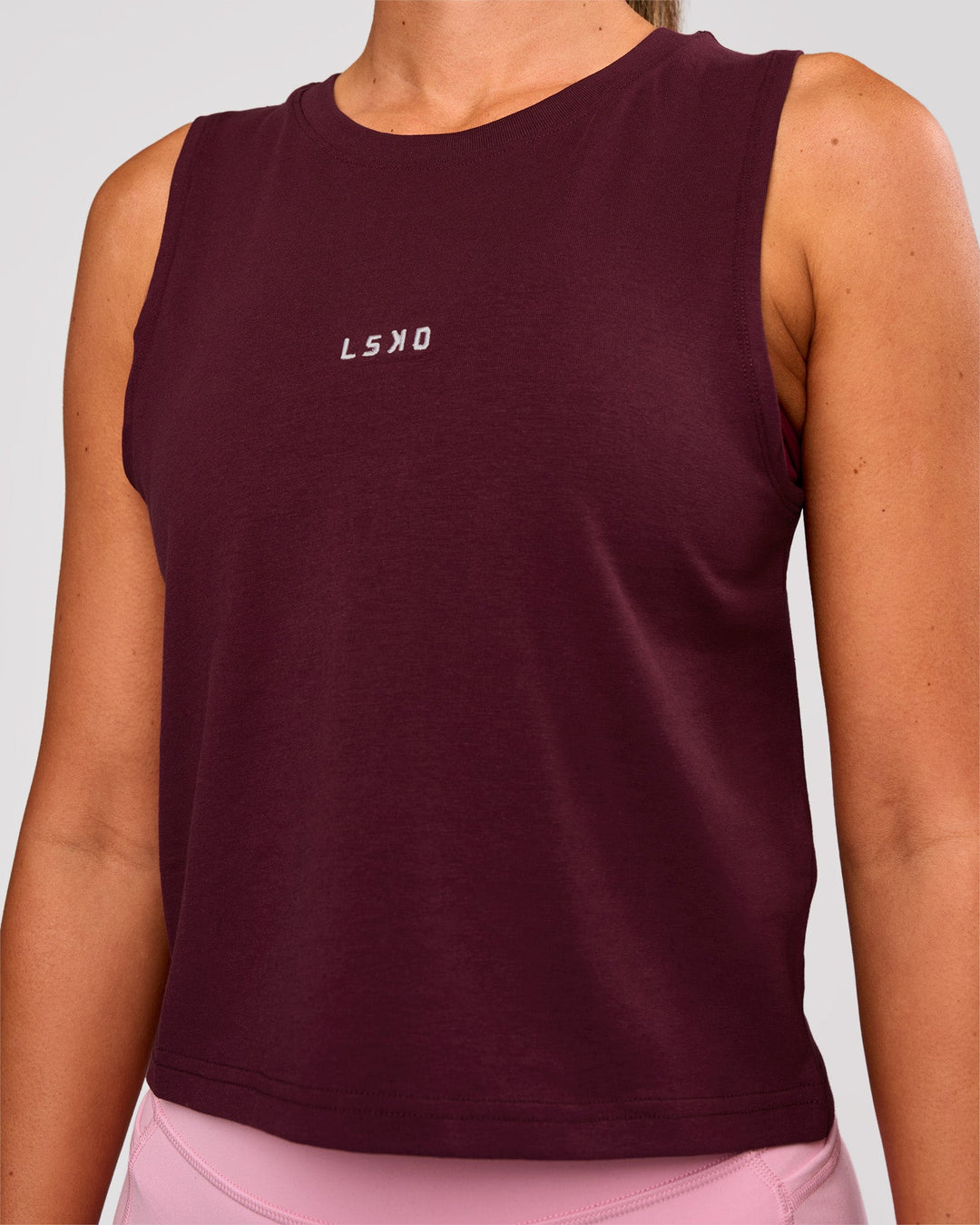 Woman wearing Go-To FLXCotton Midline Tank - Cherry Lacquer-White | Model:Charli | Size:XS - view 3