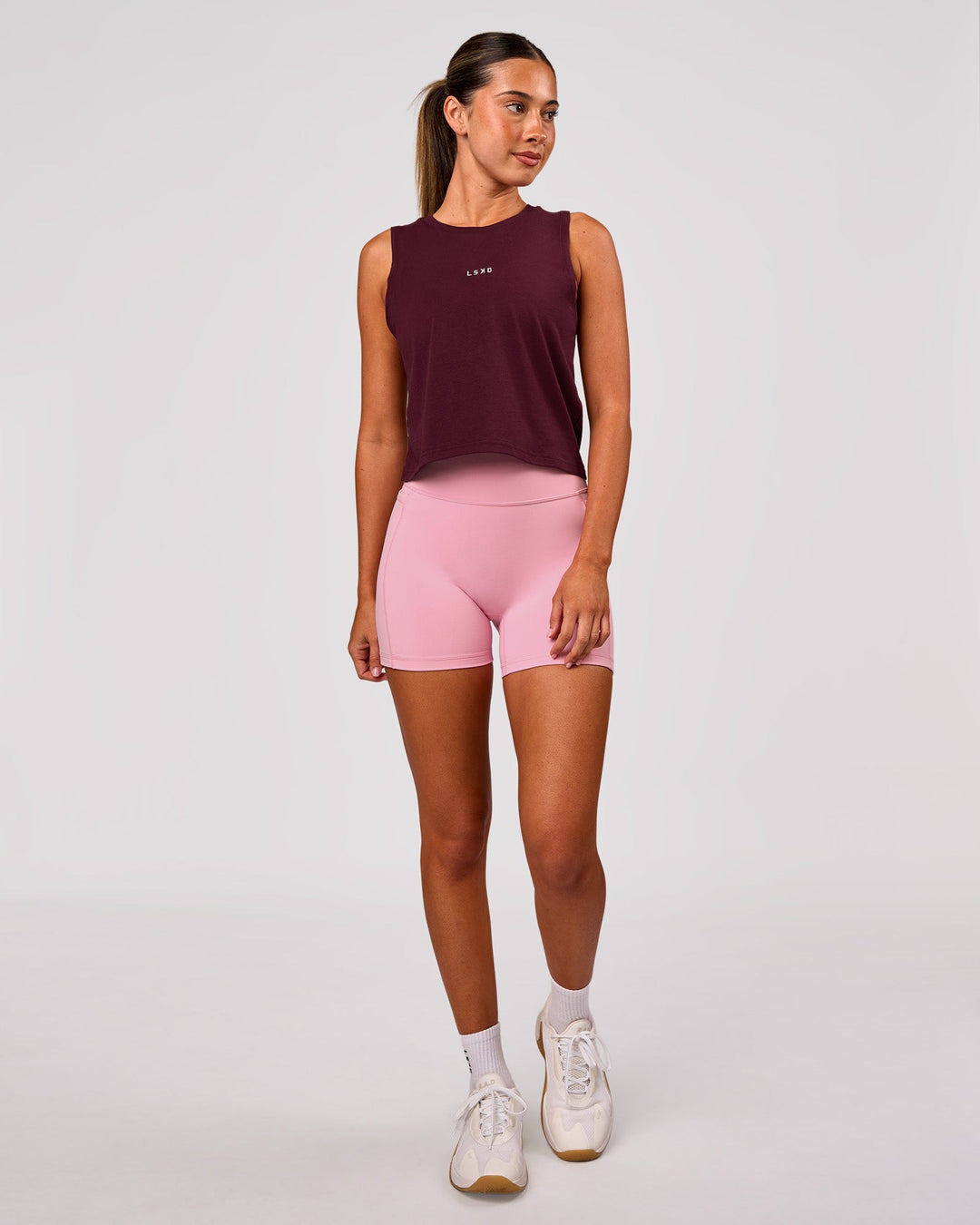 Woman wearing Go-To FLXCotton Midline Tank - Cherry Lacquer-White | Model:Charli | Size:XS - view 5