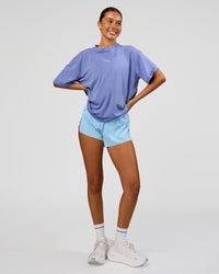 Woman wearing Go-To FLXCotton Oversized Tee - Bluebell Washed-White | Model:Charli | Size:XS | Thumbnail Index: 1