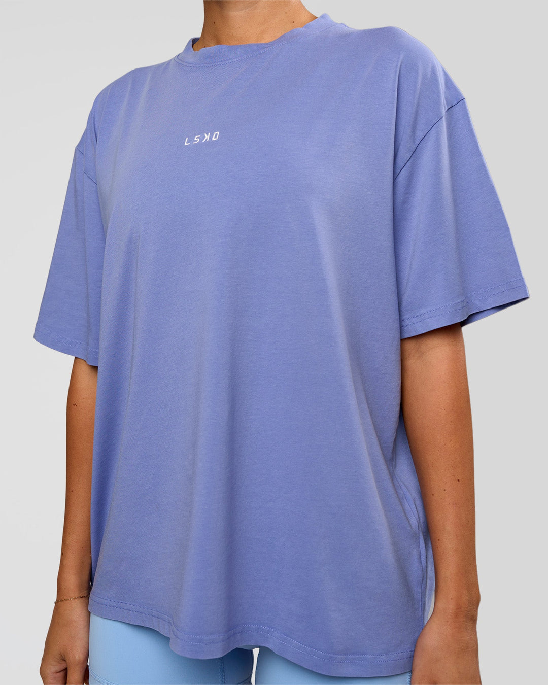 Woman wearing Go-To FLXCotton Oversized Tee - Bluebell Washed-White | Model:Charli | Size:XS - view 6