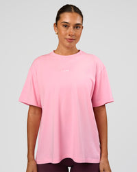 Woman wearing Go-To FLXCotton Oversized Tee - Pink Rose-White | Model:Charli | Size:XS | Thumbnail Index: 0