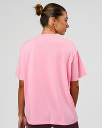 Woman wearing Go-To FLXCotton Oversized Tee - Pink Rose-White | Model:Charli | Size:XS | Thumbnail Index: 1
