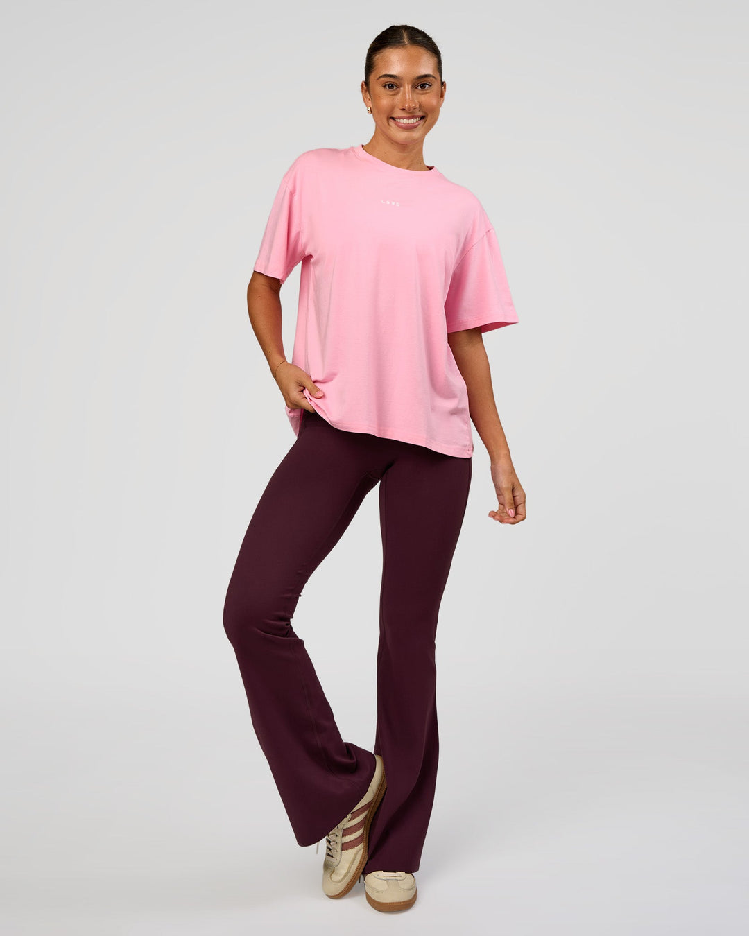 Woman wearing Go-To FLXCotton Oversized Tee - Pink Rose-White | Model:Charli | Size:XS - view 3