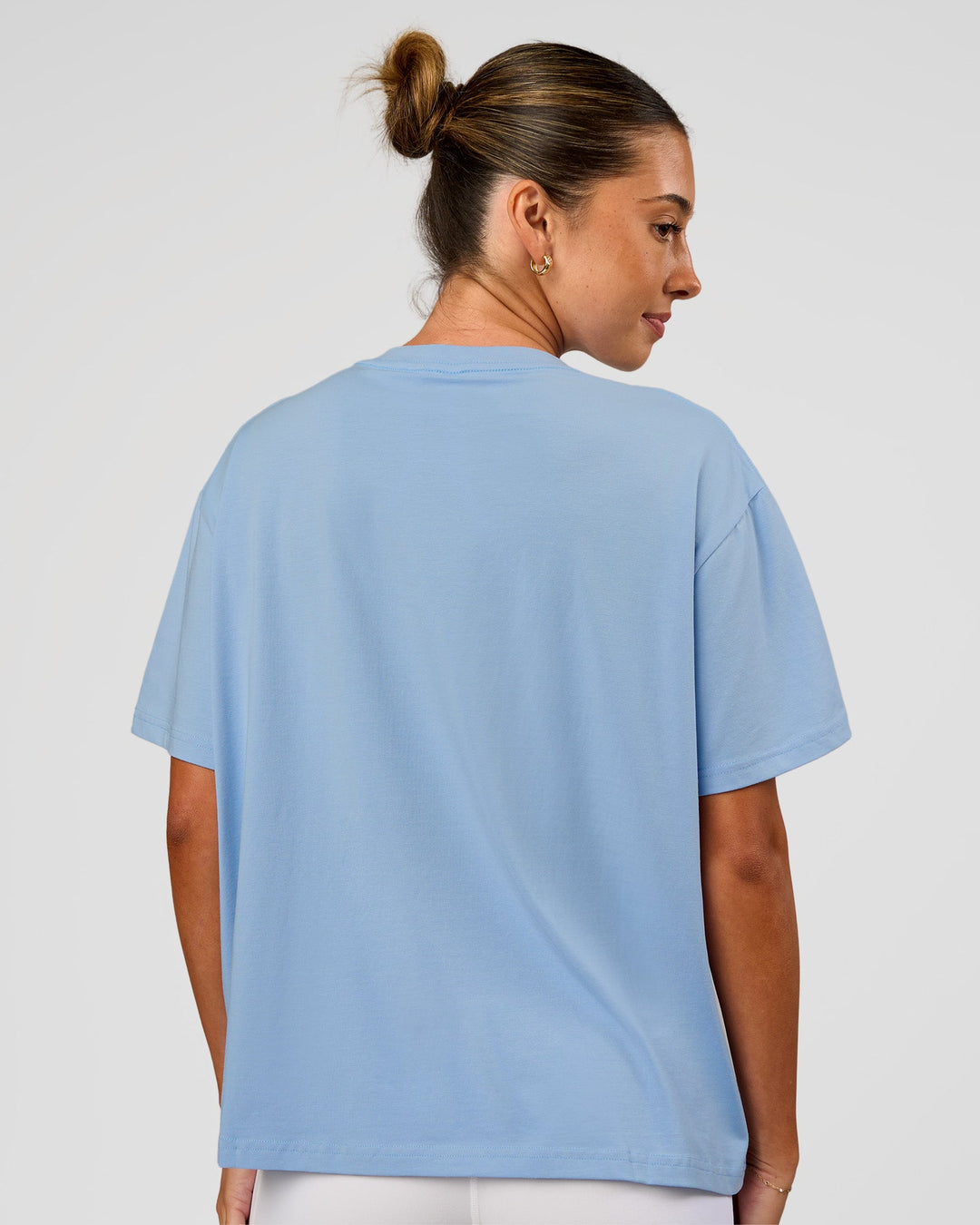 Woman wearing Go-To Script FLXCotton Oversized Tee - Open Air | Model:Charli | Size:XS
