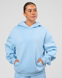 Woman wearing Go-To Script Oversized Hoodie - Open Air | Model:Charli | Size:XS