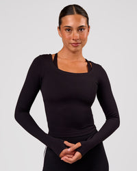 Woman wearing Horizon Long Sleeve Tee - Black | Model:Charli | Size:XS | Thumbnail Index: 0