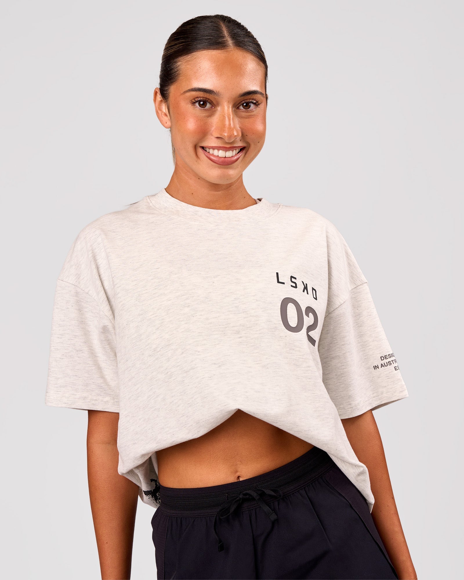 Woman wearing Hybrid Elements Heavyweight FLXCotton Oversized Tee  - Silver Marl | Model:Charli | Size:XS