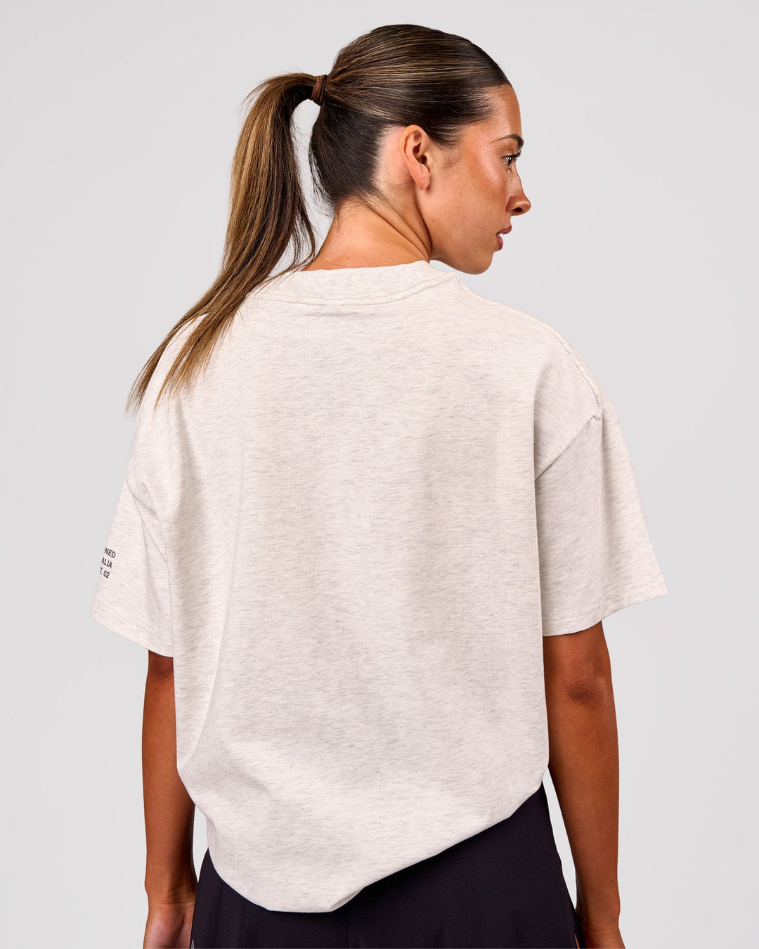 Woman wearing Hybrid Elements Heavyweight FLXCotton Oversized Tee  - Silver Marl | Model:Charli | Size:XS - view 4