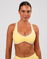 Woman wearing Luminous Sports Bra - Lemon-White | Model:Charli | Size:XS | Thumbnail Index: 7