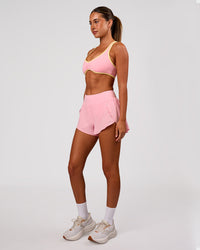Woman wearing Luminous Sports Bra - Pink Rose-Lemon | Model:Charli | Size:XS | Thumbnail Index: 9