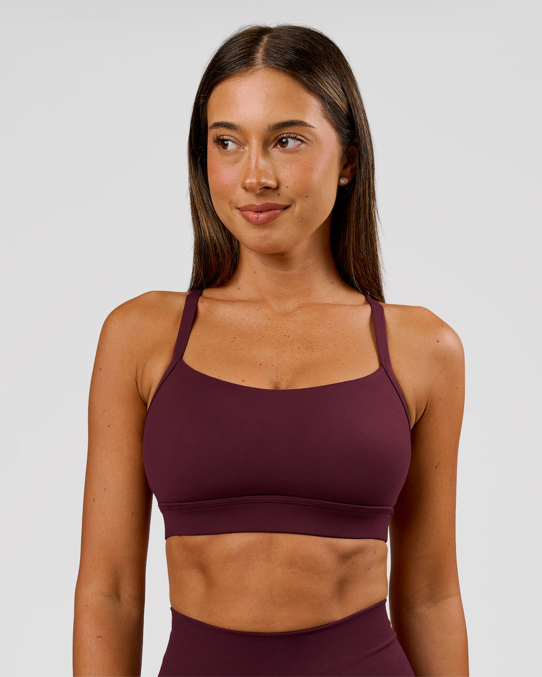 Woman wearing Momentum Sports Bra D/DD/E - Cherry Lacquer | Model:Charli | Size:XS - view 1