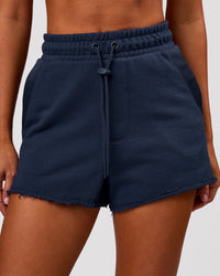 Woman wearing MVP Elite Terry Short - Future Navy | Model:Charli | Size:XS | Thumbnail Index: 1