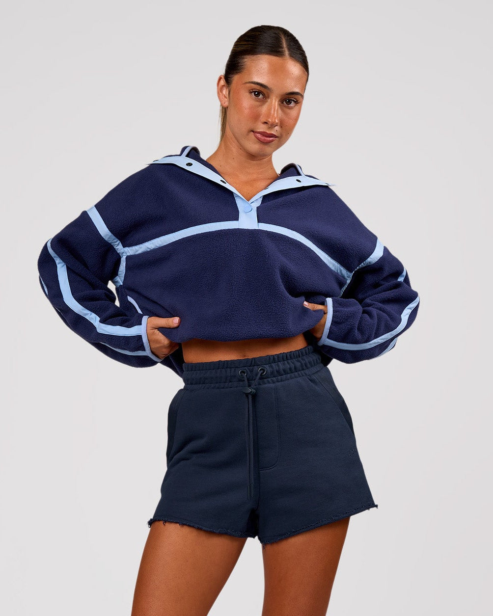 Woman wearing MVP Elite Terry Short - Future Navy | Model:Charli | Size:XS