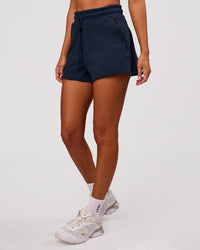 Woman wearing MVP Elite Terry Short - Future Navy | Model:Charli | Size:XS | Thumbnail Index: 7