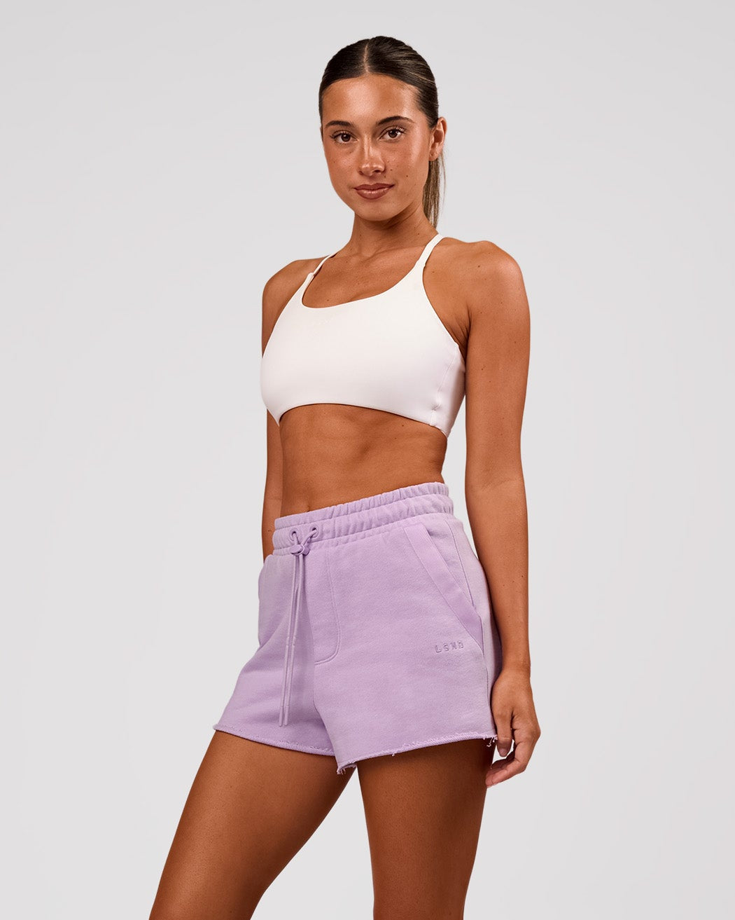 Woman wearing MVP Elite Terry Short - Pale Lilac | Model:Charli | Size:XS