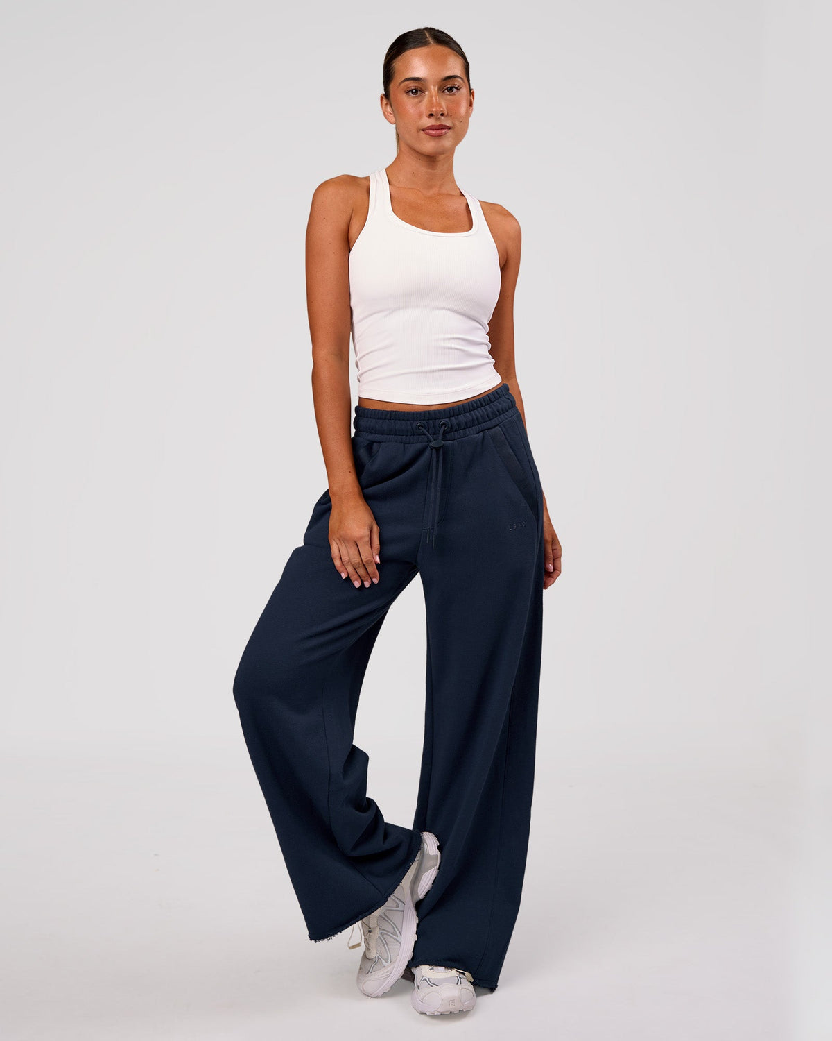 Woman wearing MVP Elite Terry Wide Leg Pant - Future Navy | Model:Charli | Size:XS