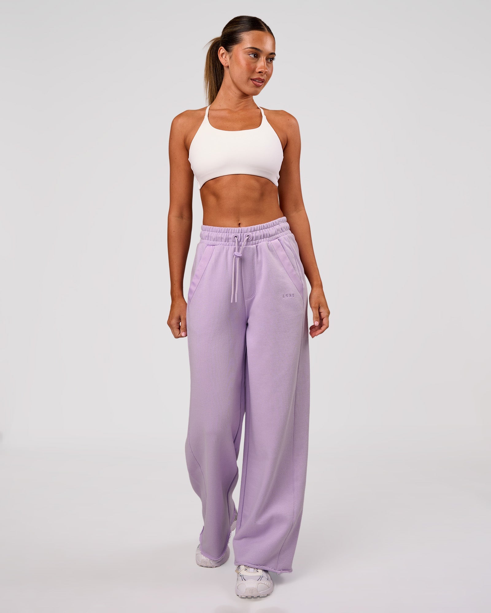 Woman wearing MVP Elite Terry Wide Leg Pant - Pale Lilac | Model:Charli | Size:XS
