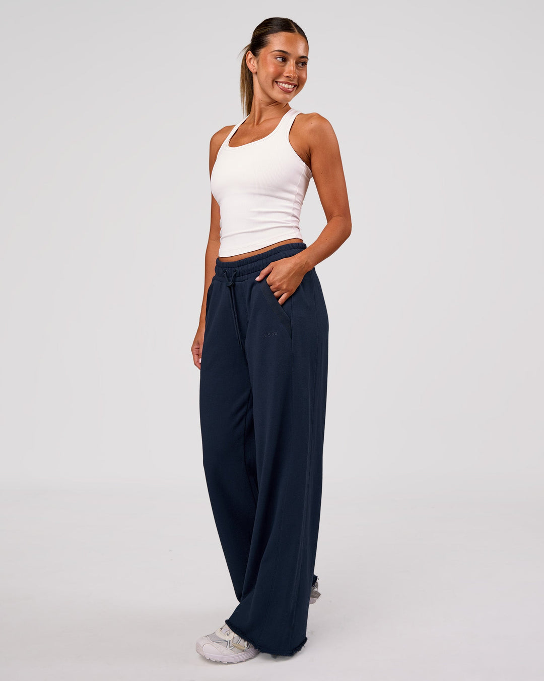 Woman wearing MVP Elite Terry Wide Leg Pant - Future Navy | Model:Charli | Size:XS - view 7