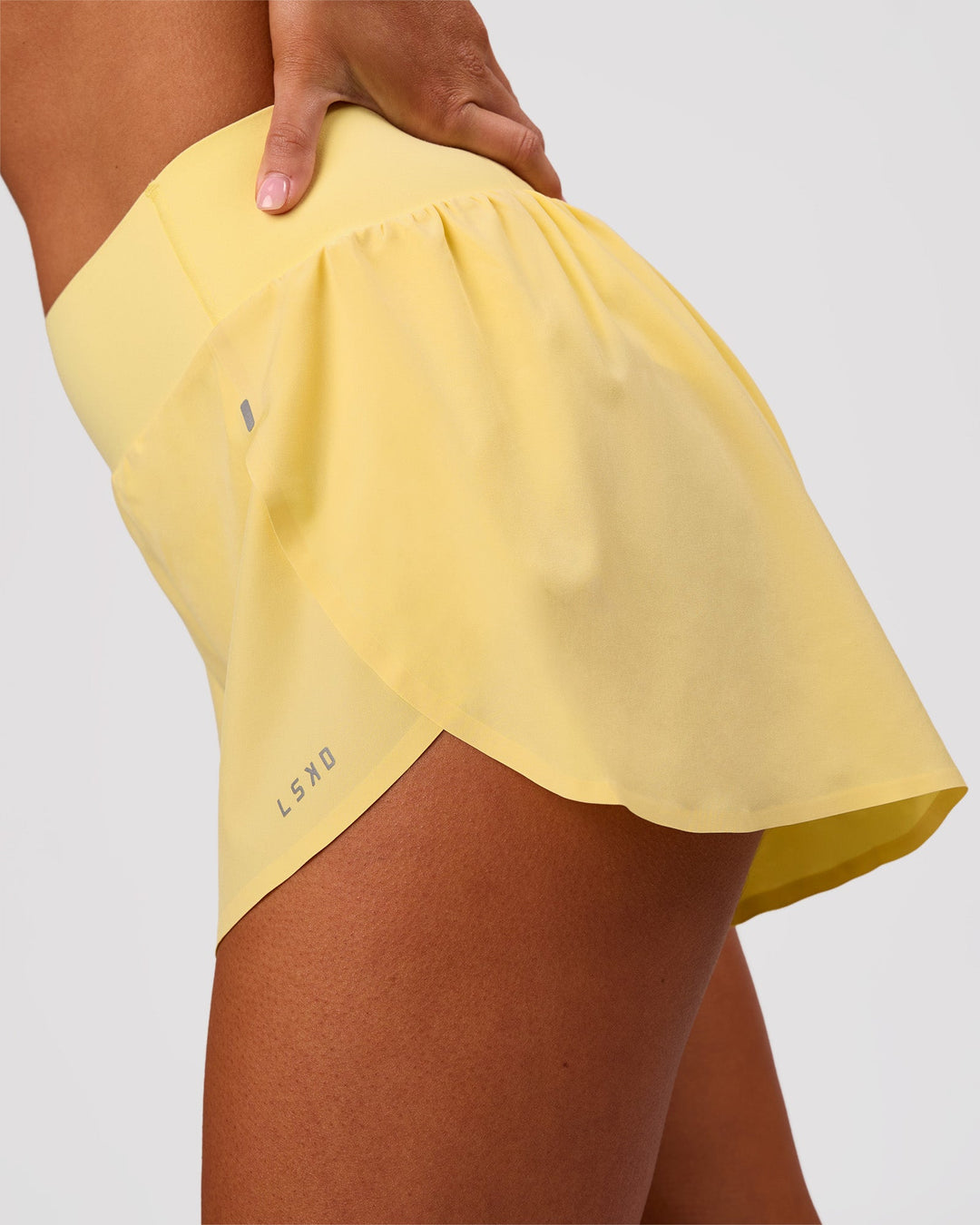 Woman wearing Pacer 3" Run Short - Lemon | Model:Charli | Size:XS - view 5