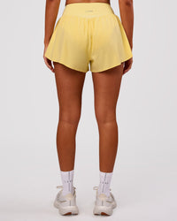Woman wearing Pacer 3" Run Short - Lemon | Model:Charli | Size:XS | Thumbnail Index: 6