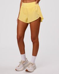 Woman wearing Pacer 3" Run Short - Lemon | Model:Charli | Size:XS | Thumbnail Index: 10