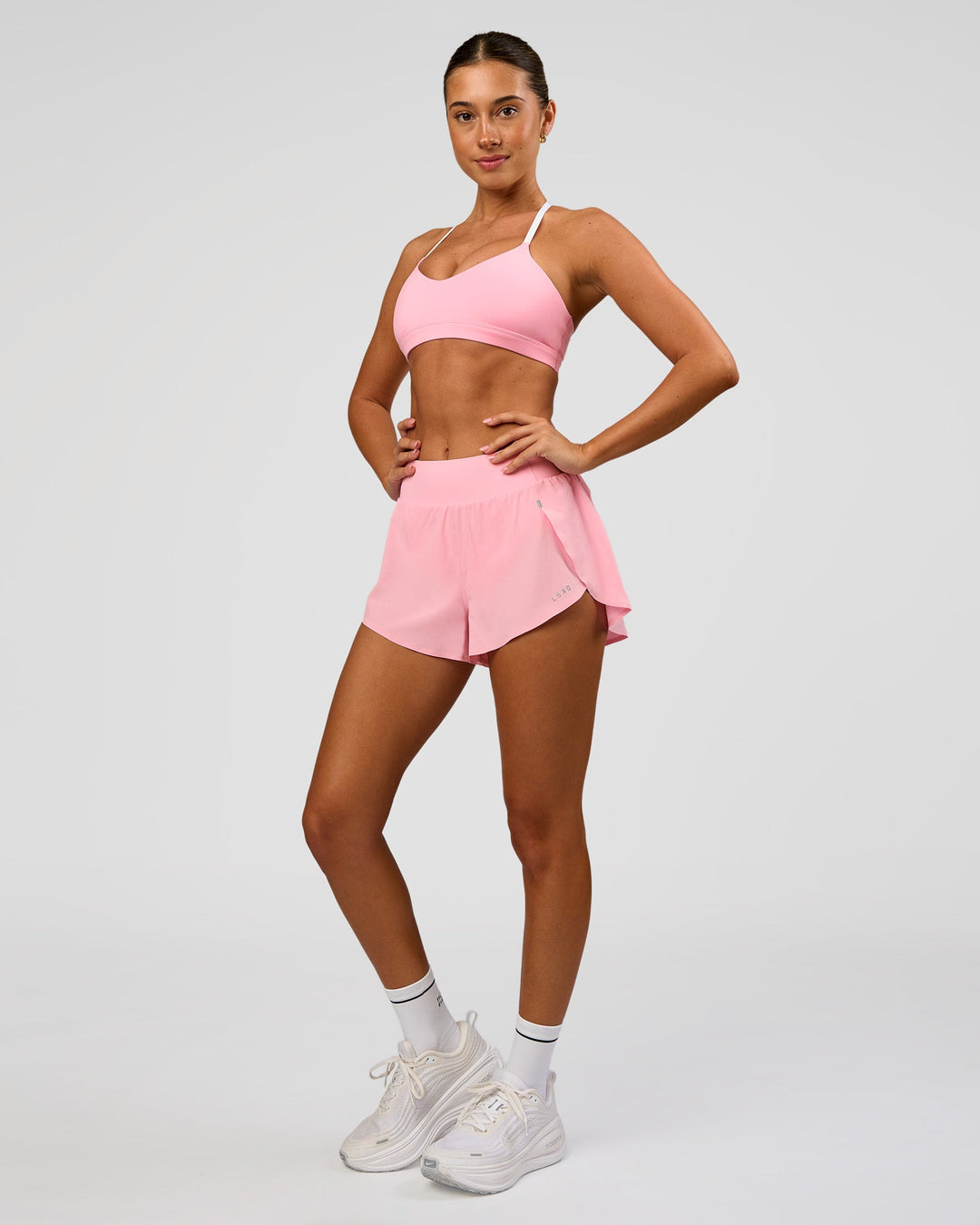 Woman wearing Pacer 3" Run Short - Pink Rose | Model:Charli | Size:XS - view 3