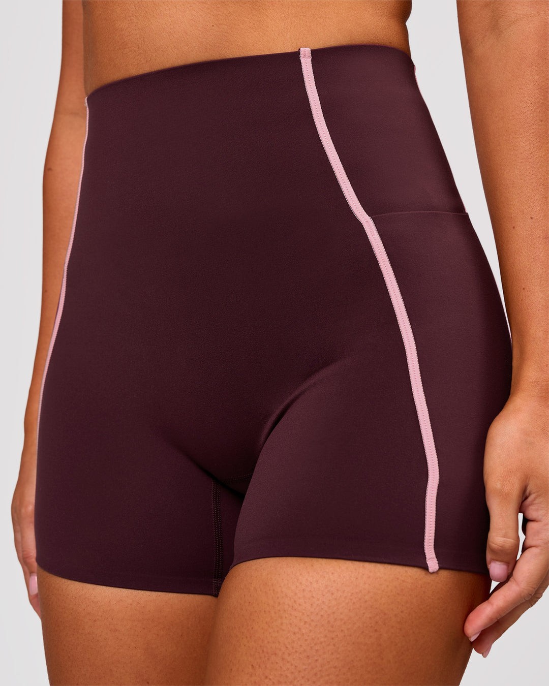 Woman wearing Power Ultra High-Rise 4" Short Pockets - Cherry Lacquer-Pink Rose | Model:Charli | Size:XS - view 1