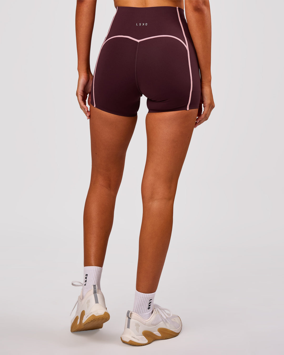 Woman wearing Power Ultra High-Rise 4" Short Pockets - Cherry Lacquer-Pink Rose | Model:Charli | Size:XS - view 5