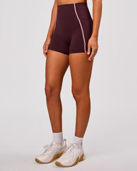 Woman wearing Power Ultra High-Rise 4" Short Pockets - Cherry Lacquer-Pink Rose | Model:Charli | Size:XS | Thumbnail Index: 5