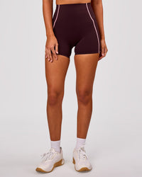 Woman wearing Power Ultra High-Rise 4" Short Pockets - Cherry Lacquer-Pink Rose | Model:Charli | Size:XS | Thumbnail Index: 6