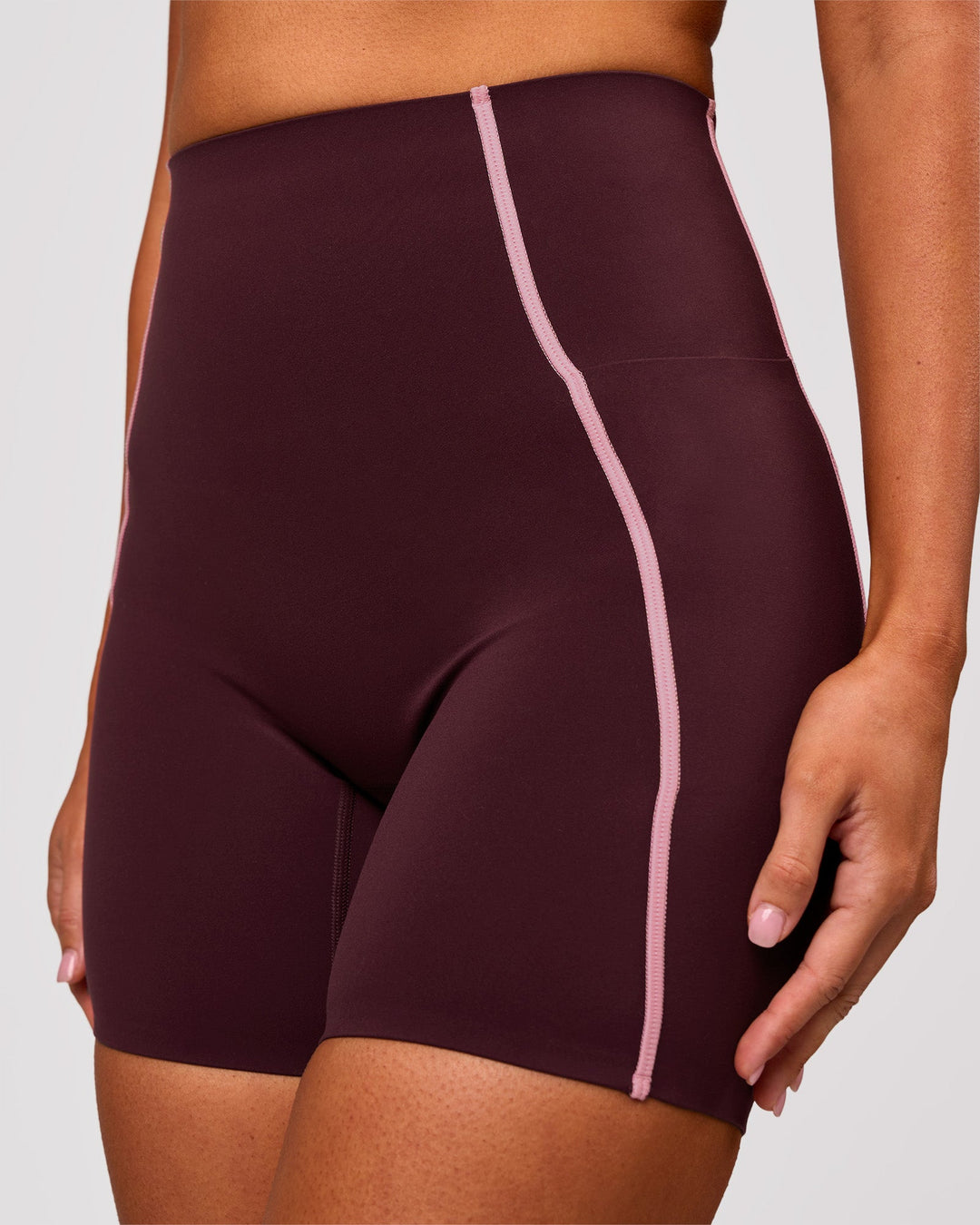 Woman wearing Power Ultra High-Rise 6" Short Pockets - Cherry Lacquer-Pink Rose | Model:Charli | Size:XS - view 1
