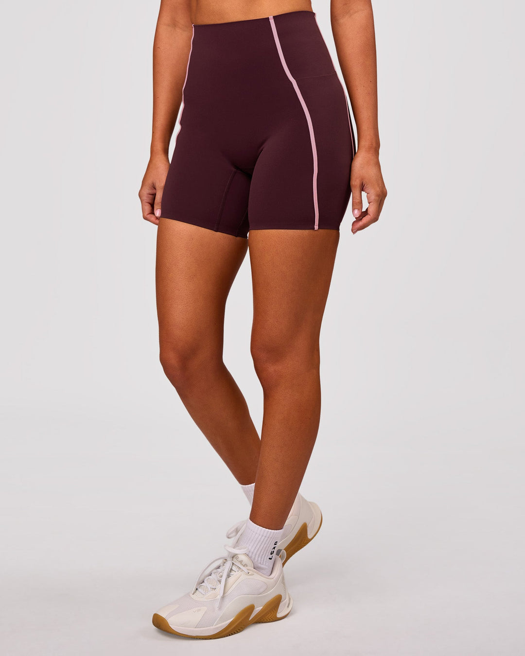 Woman wearing Power Ultra High-Rise 6" Short Pockets - Cherry Lacquer-Pink Rose | Model:Charli | Size:XS - view 4