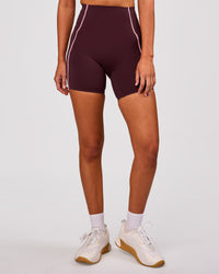 Woman wearing Power Ultra High-Rise 6" Short Pockets - Cherry Lacquer-Pink Rose | Model:Charli | Size:XS | Thumbnail Index: 4