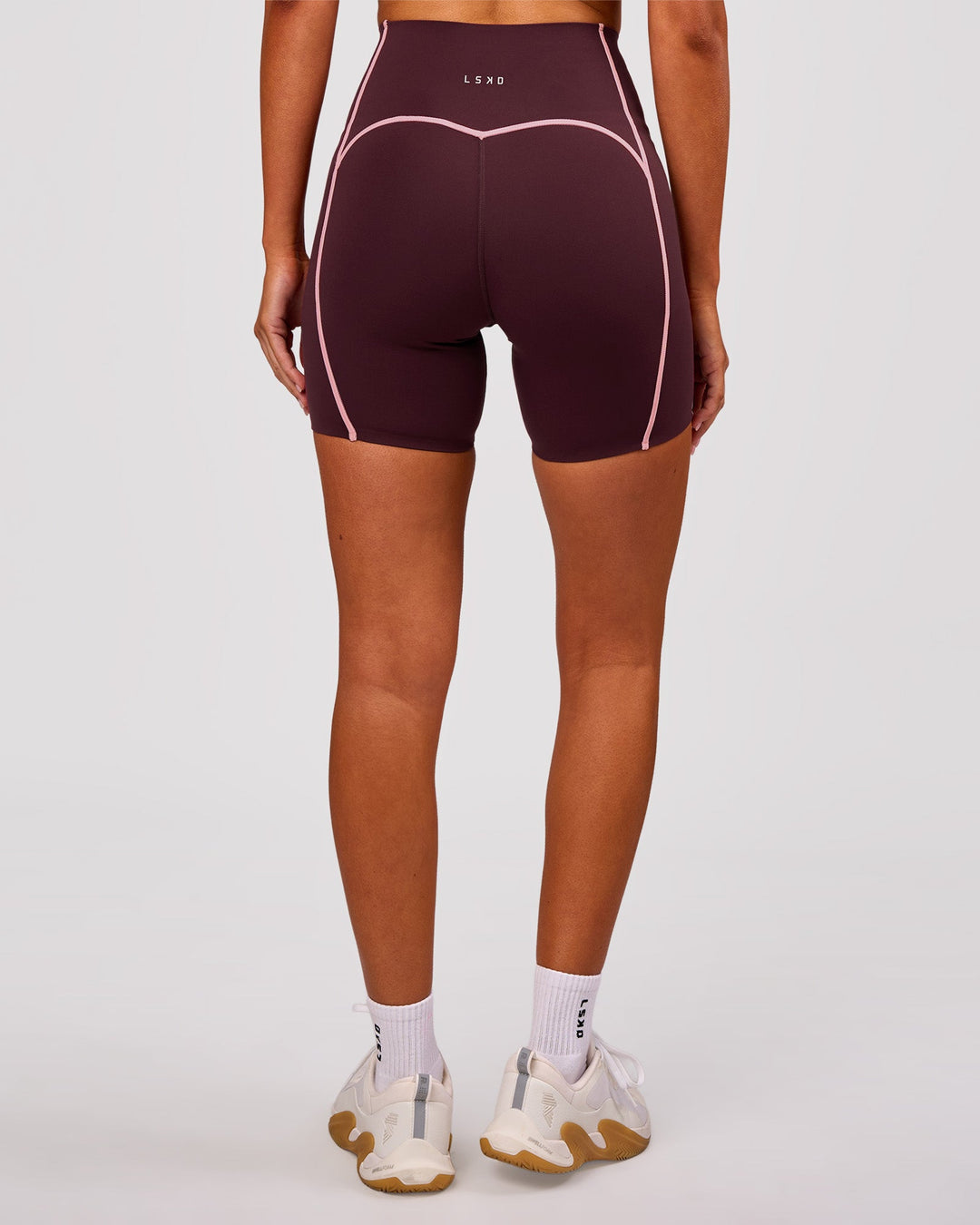 Woman wearing Power Ultra High-Rise 6" Short Pockets - Cherry Lacquer-Pink Rose | Model:Charli | Size:XS - view 6