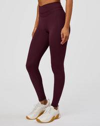 Woman wearing Solstice High-Rise Full Length Legging - Cherry Lacquer | Model:Charli | Size:XS | Thumbnail Index: 2