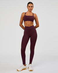Woman wearing Solstice High-Rise Full Length Legging - Cherry Lacquer | Model:Charli | Size:XS | Thumbnail Index: 3