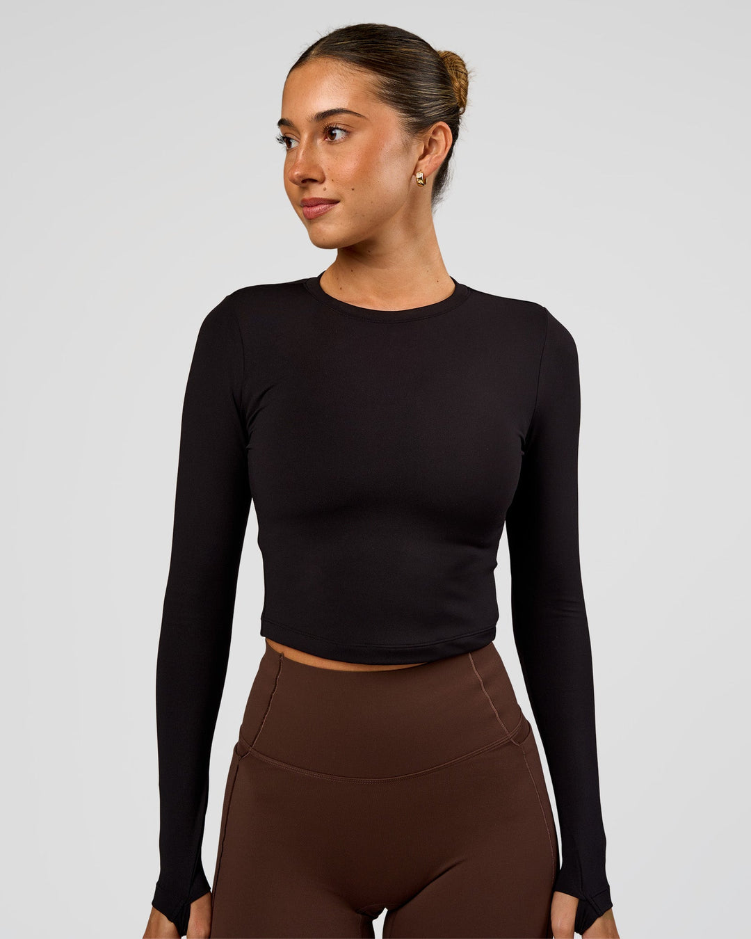 Woman wearing Staple Long Sleeve Cropped Tee 2.0 - Black | Model:Charli | Size:XS - view 1