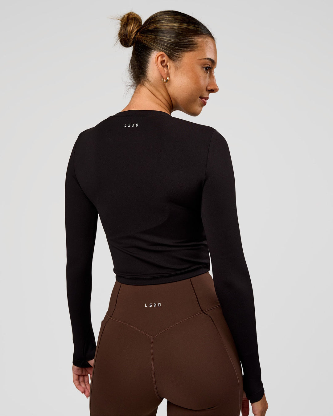 Woman wearing Staple Long Sleeve Cropped Tee 2.0 - Black | Model:Charli | Size:XS - view 2