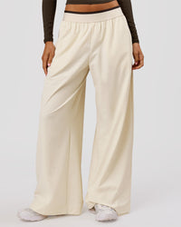 Woman wearing Stride Wide Leg Pant - Vanilla Bean | Model:Charli | Size:XS | Thumbnail Index: 6
