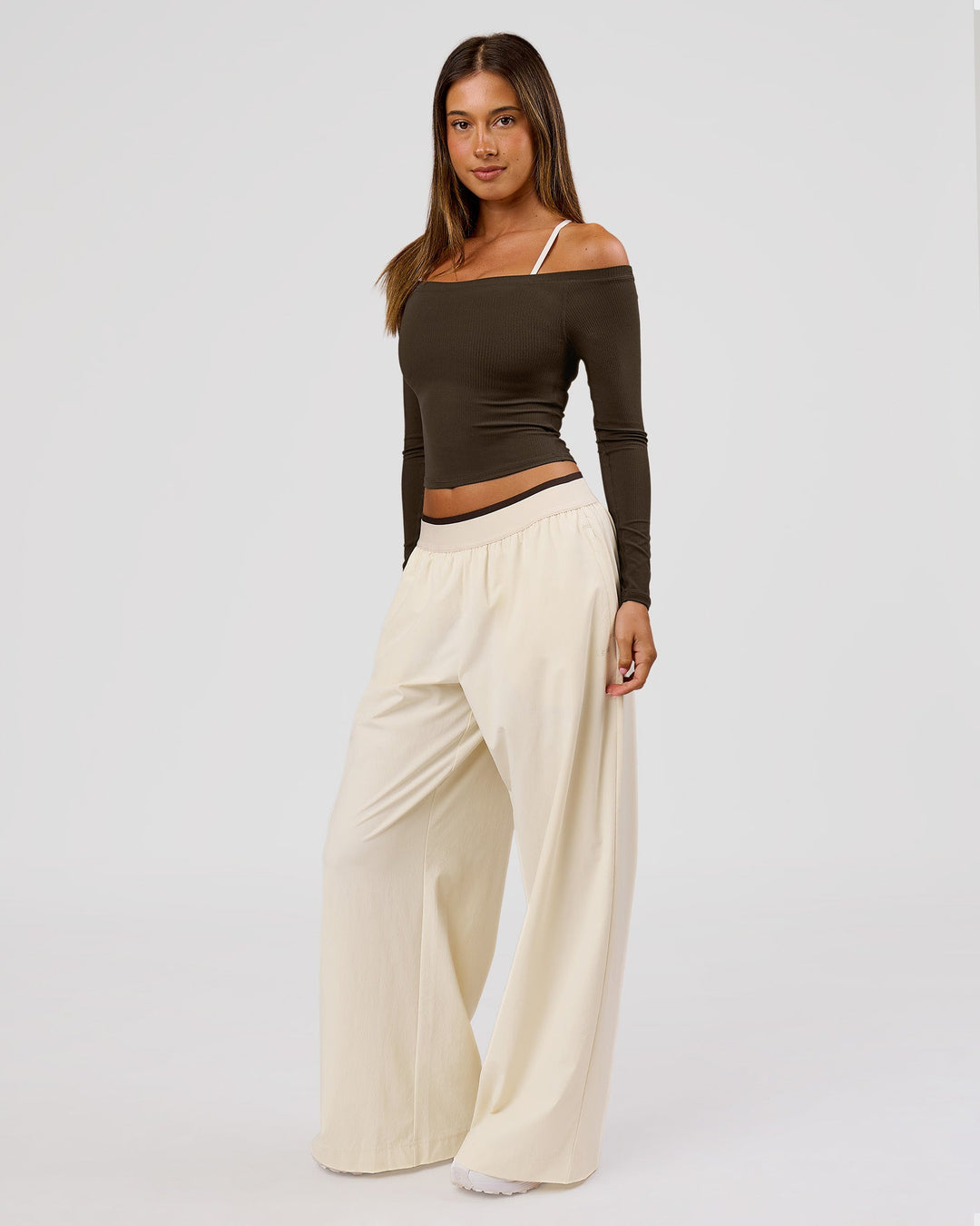 Woman wearing Stride Wide Leg Pant - Vanilla Bean | Model:Charli | Size:XS - view 10