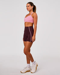 Woman wearing Unleash Sports Bra - Pink Rose | Model:Charli | Size:XS | Thumbnail Index: 5